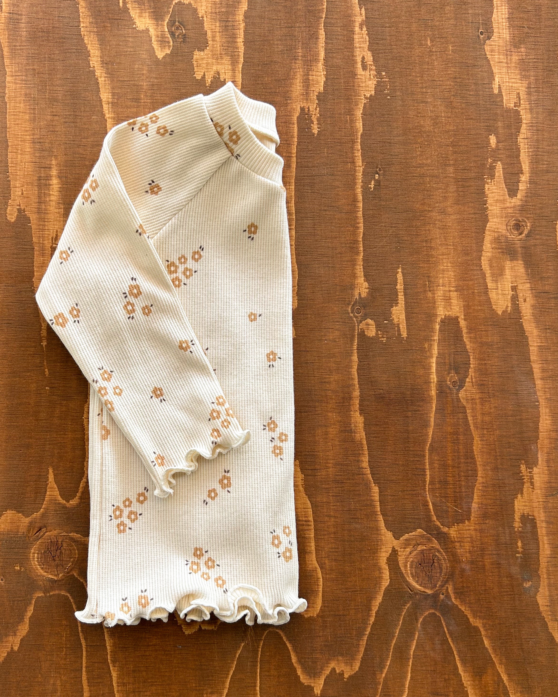 Maglia a costine con fantasia floreale