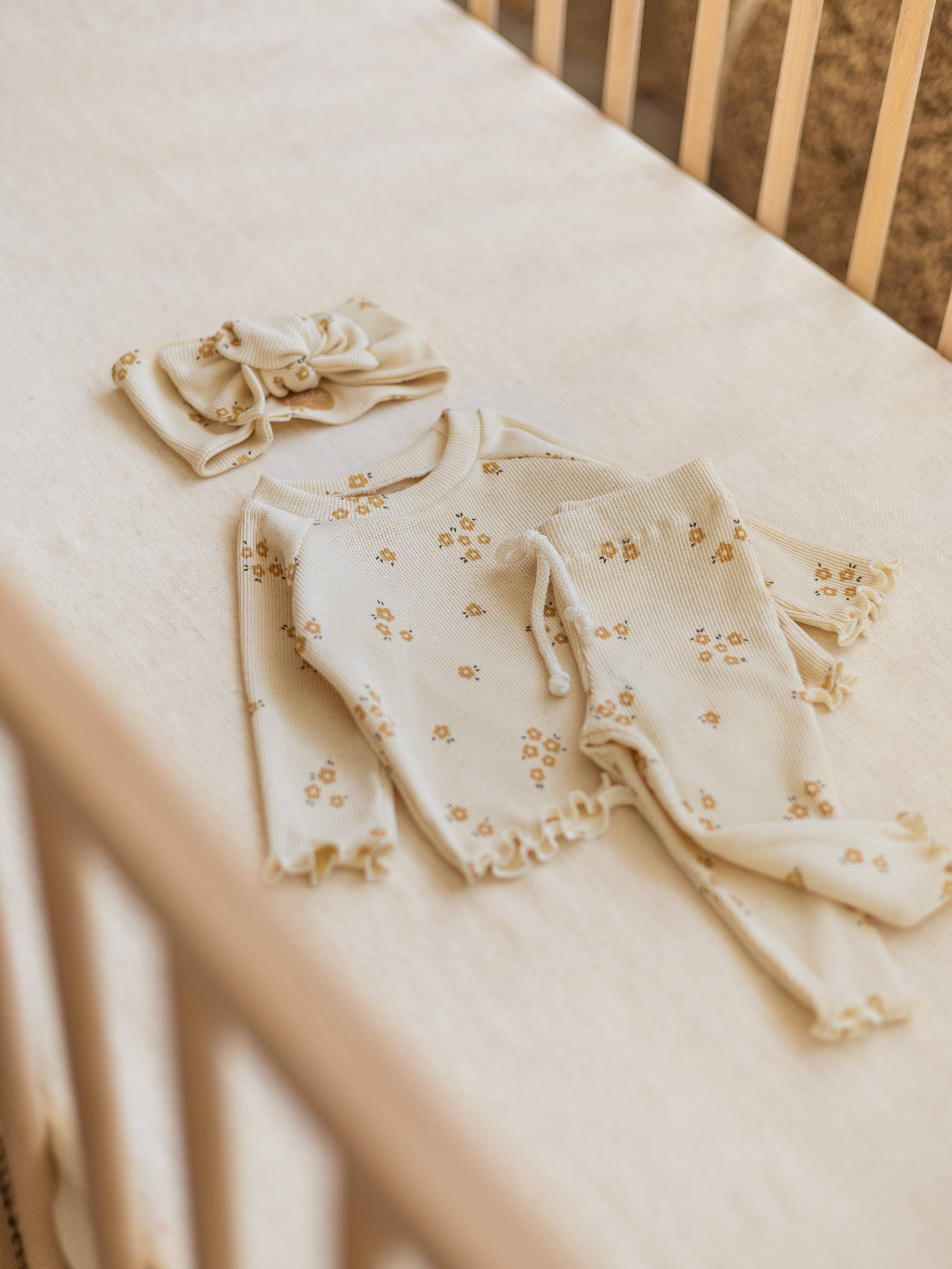 Maglia a costine con fantasia floreale